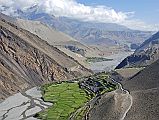 107 Kagbeni With Upper Mustang Beyond Kagbeni (2840m) is a green oasis at the junction of the Jhong Khola and the Kali Gandaki valleys, with Upper Mustang to the north. It is an ancient town that has been involved in the salt trade for thousands of years.